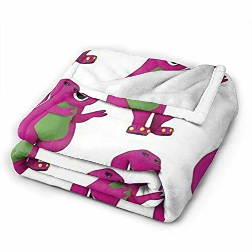 Fleece blanket with purple dinosaur design